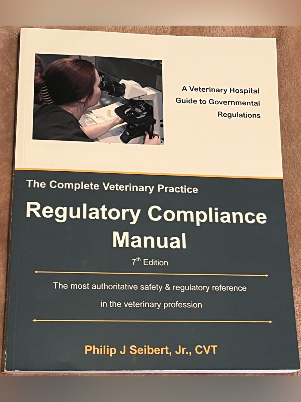 Regulatory Compliance Manual - Dark Teal & Cream Cover